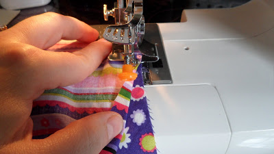 The fabrics should be right sides together, with the fabric to be ruffled on top. The fabrics should be right sides together, with the fabric to be ruffled on top.